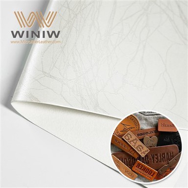 Dažādi raksti PU mākslīgās ādas mākslīgais audums etiķešu materiālam